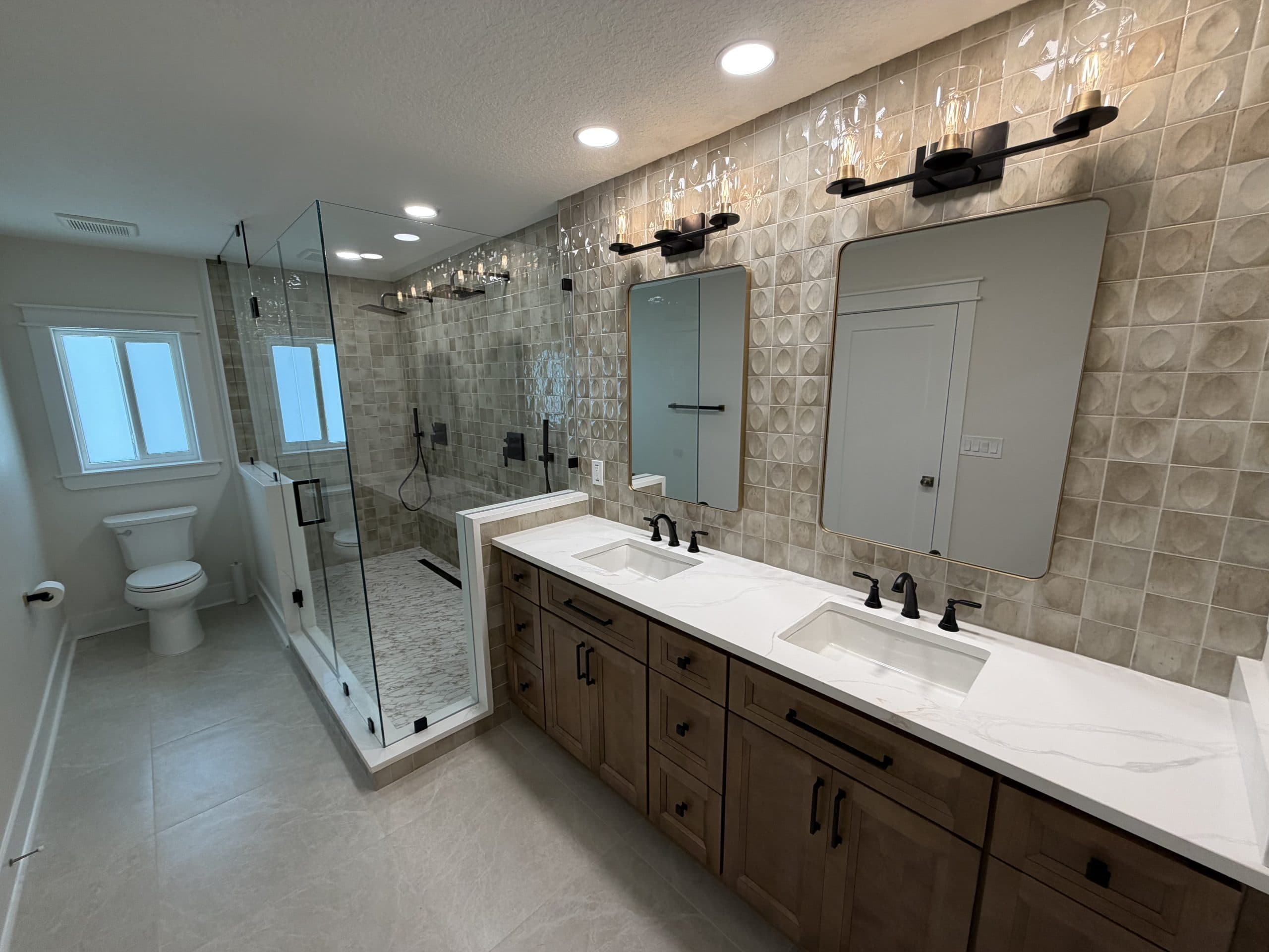 Frameless glass walk-in shower with tile surround — Tampa Bay